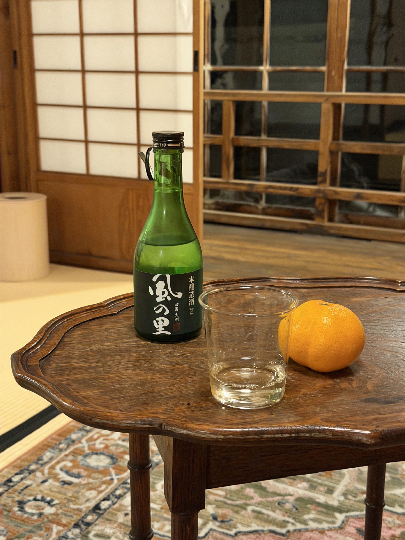 Sake and an orange in the room