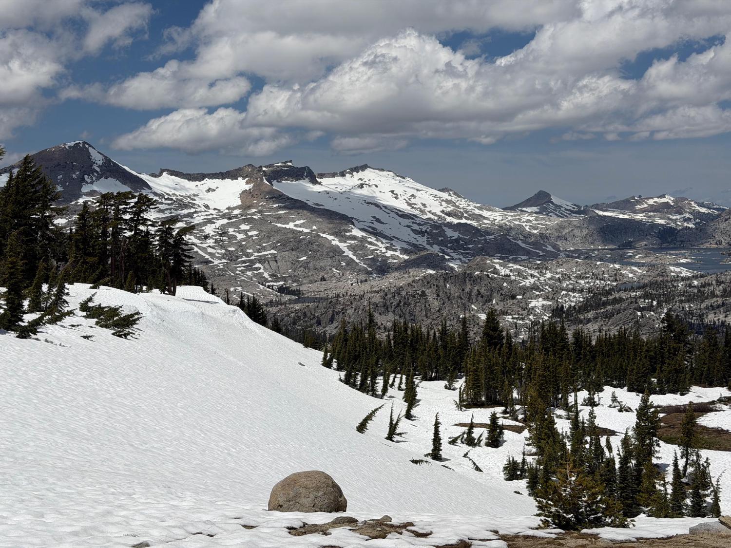 Snow-covered peaks above Lake Aloha, seen across a snowfield